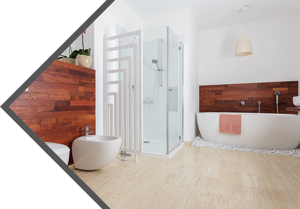 A bathroom with a shower, toilet and sink.